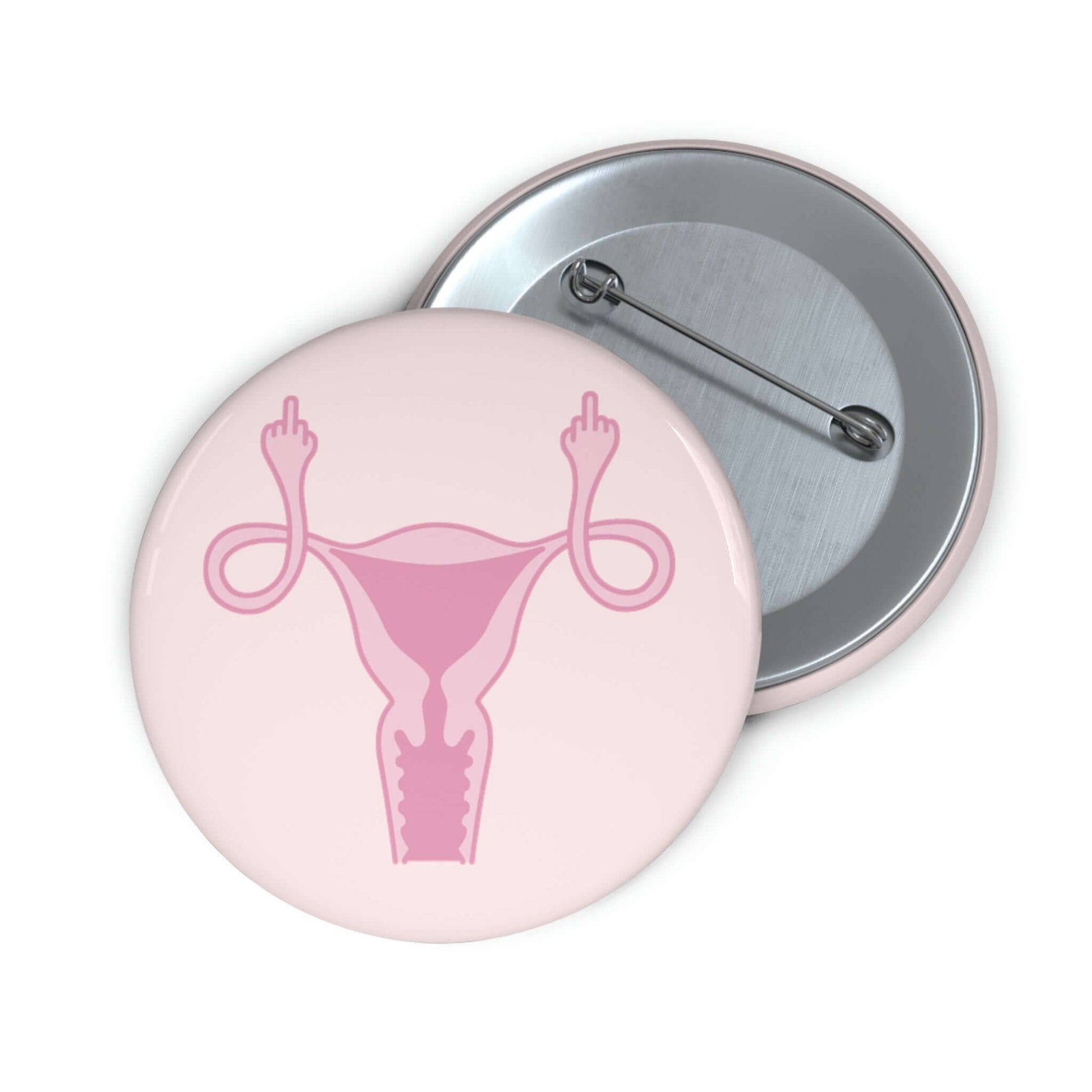 Pink pinback button with image of a uterus flipping the middle finger. 