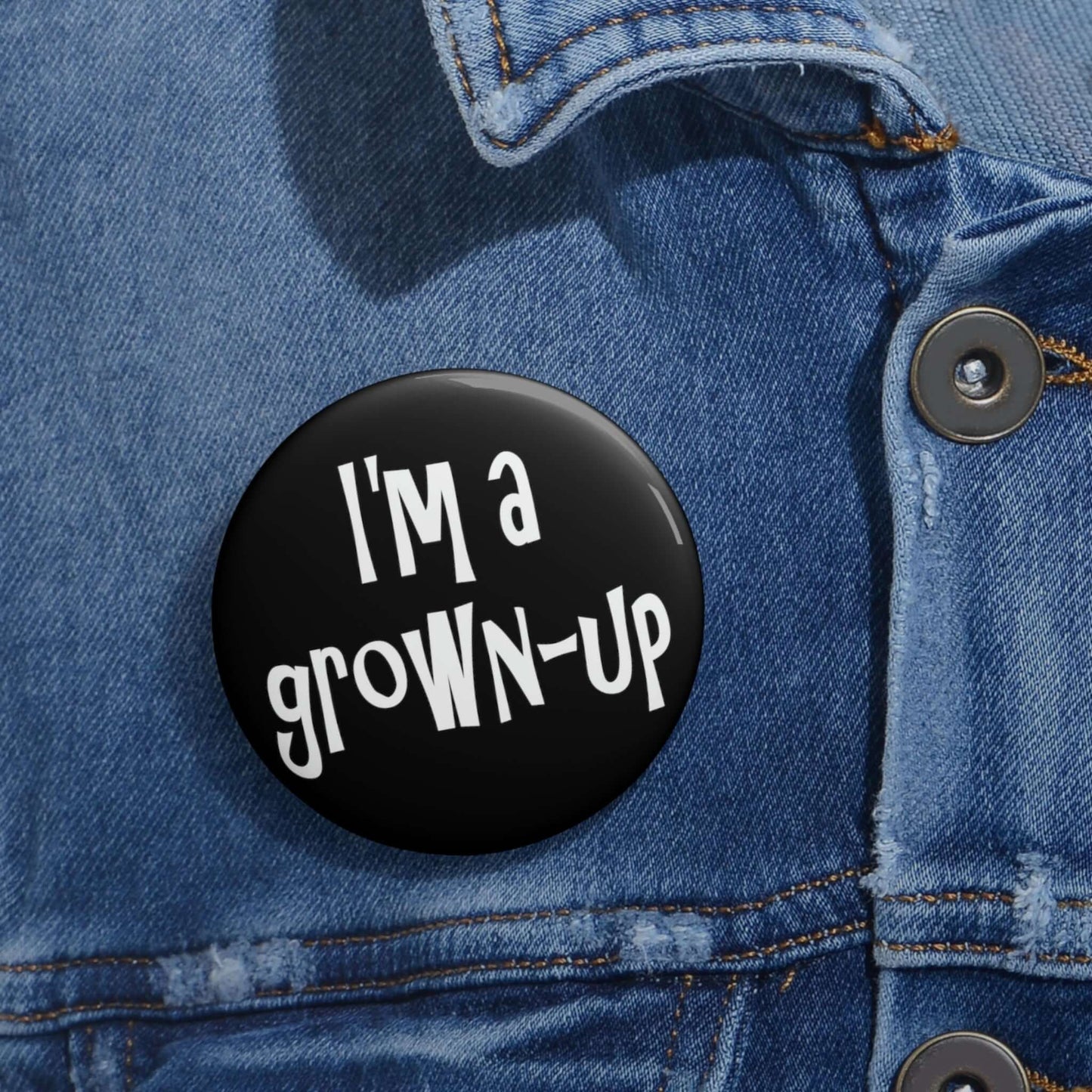 Pin-back button that says I'm a grown-up.