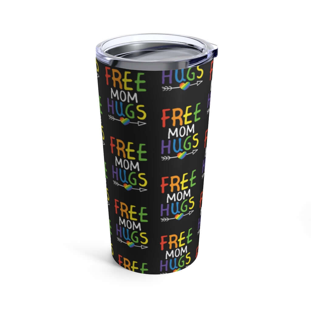 Double wall stainless steel tumbler with clear plastic lid. Tumbler is black with the words Free Mom hugs in rainbow lettering printed all over the mug.