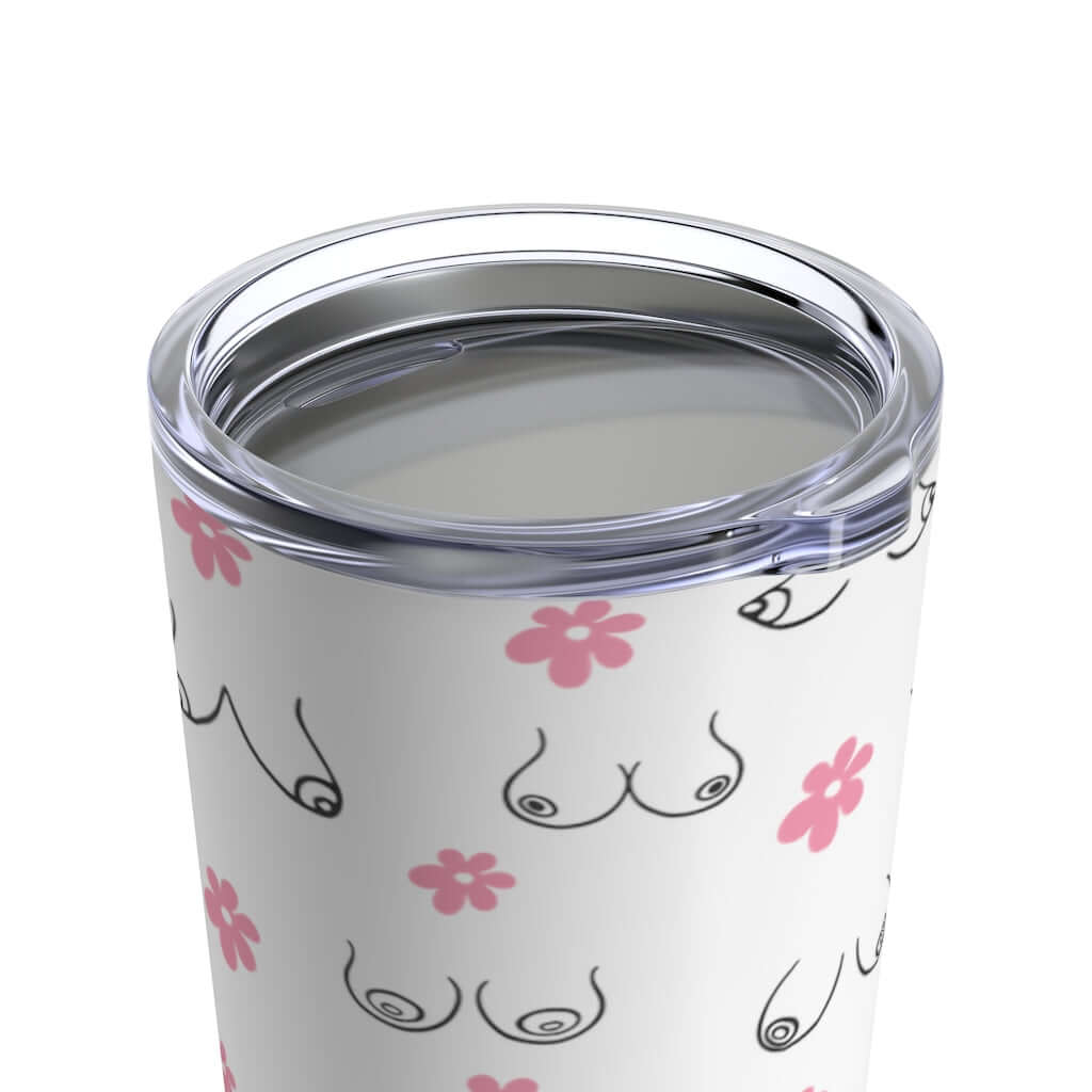 White double wall stainless steel tumbler with clear lid. The tumbler has line drawings of breasts and pink flowers printed all over.