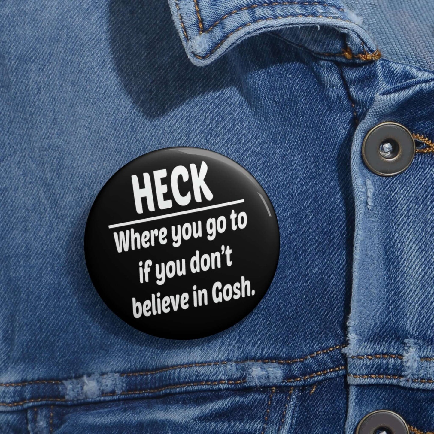 Pin-back button that says Heck where you go to when you don't believe in Gosh.