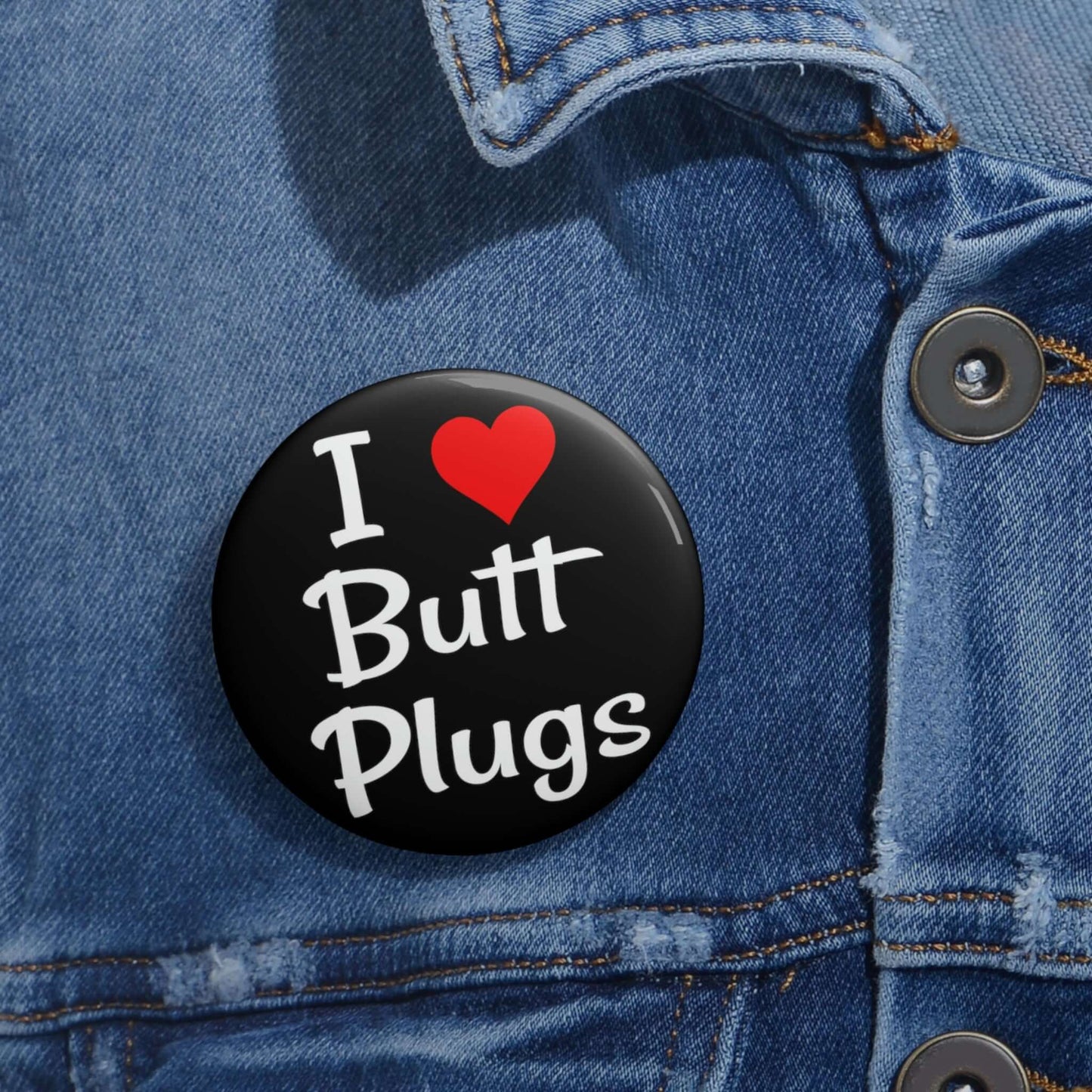 Pinback button that says I heart butt plugs.