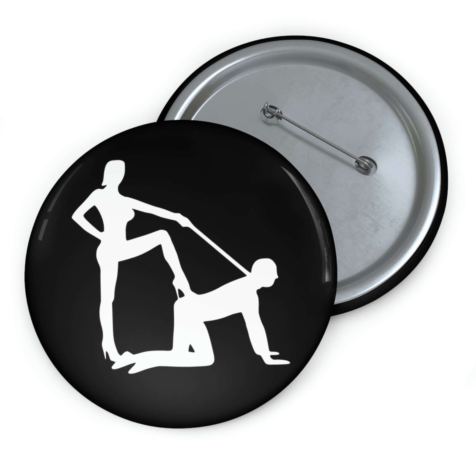 Pin-back button with silhouette image of a man on his hands and knees and a dominatrix holding his leash.