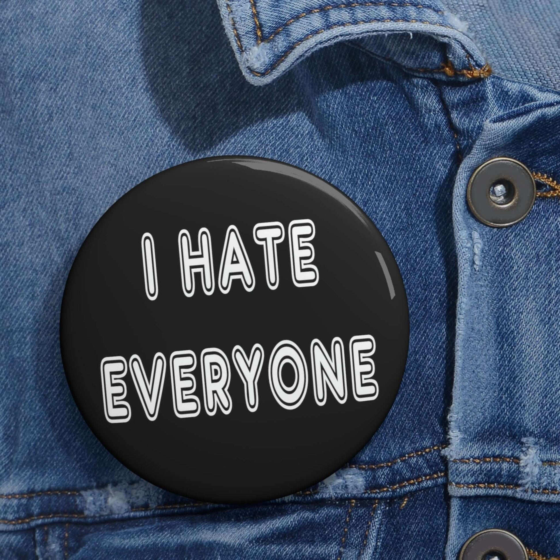 Black pinback button that says I hate everyone.