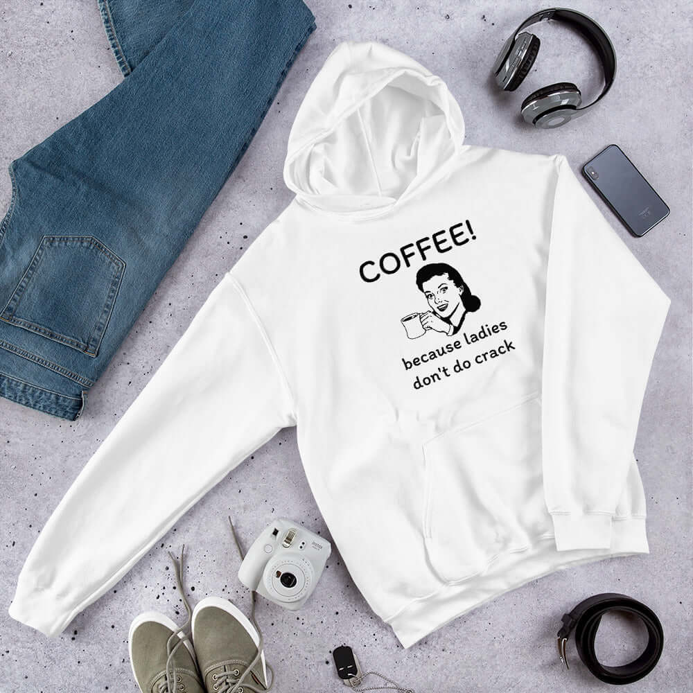 White hoodie sweatshirt with an image of a retro woman holding a coffee mug with the phrase Coffee, because ladies don't do crack printed on the front.