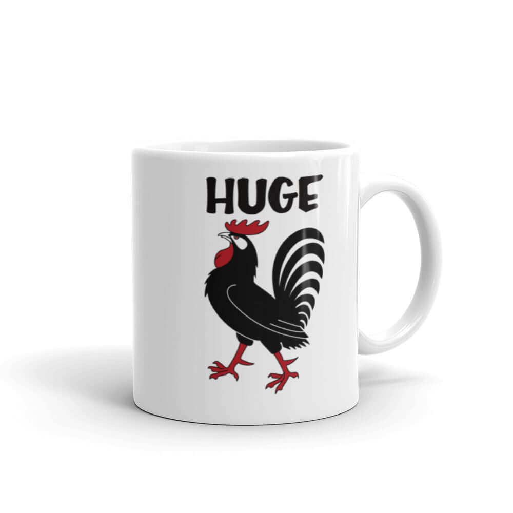 White ceramic mug with an image of a rooster and the word Huge above the rooster printed on both sides.