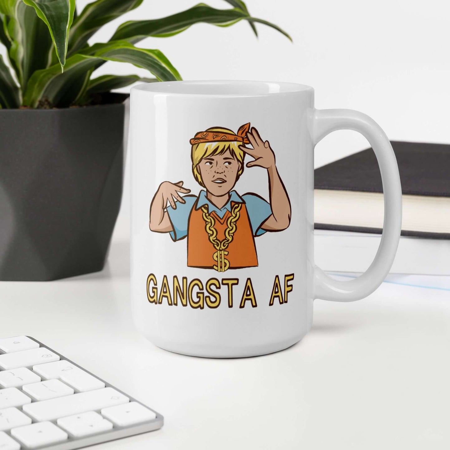 White ceramic mug with a parody image of a blond haired child trying to be a gangster with the words Gangsta AF printed on both sides.