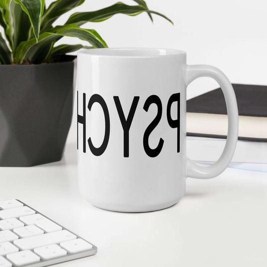 White ceramic coffee mug with the word Psychology printed in reverse. The text wraps around the mug.