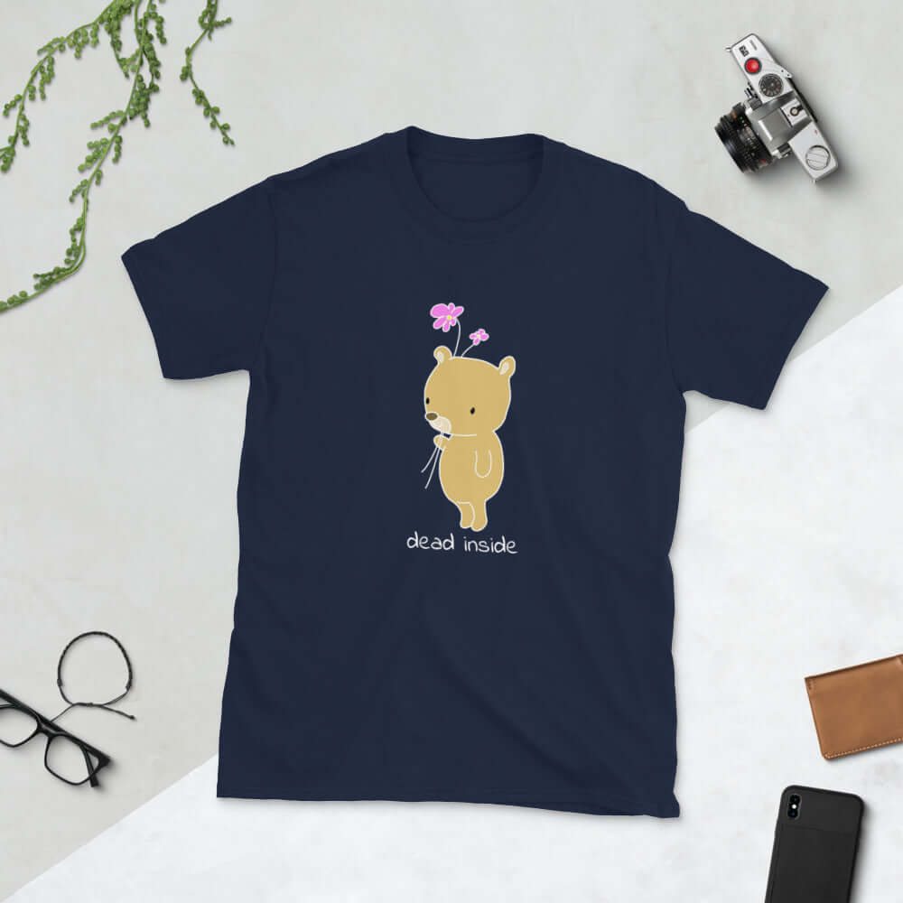 Navy blue t-shirt with an image of a cute bear holding 2 pink flowers. The words Dead inside are printed underneath the bear. The graphics are printed on the front of the shirt.