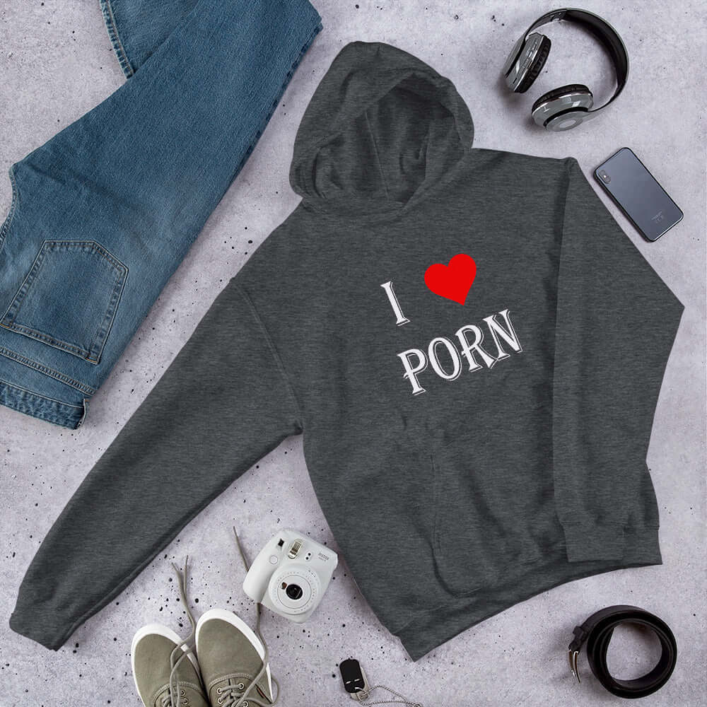 Dark heather grey hoodie sweatshirt with the phrase I heart porn printed on the front. The heart is red.