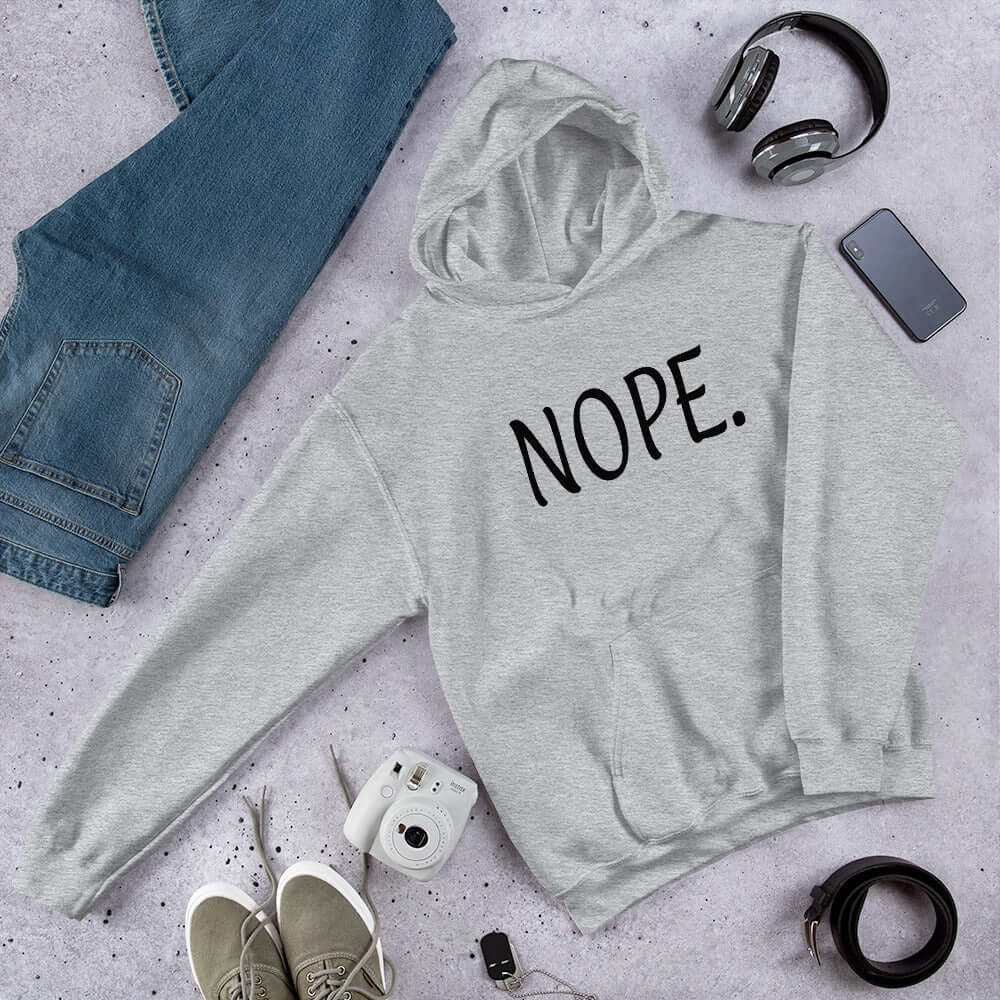 Light sport grey hoodie sweatshirt with the word Nope printed on the front.