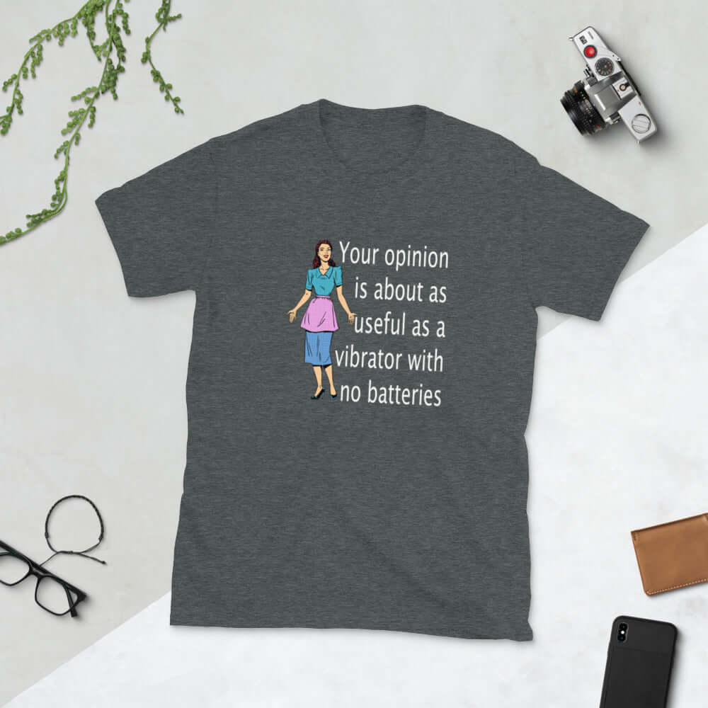 Dark heather grey t-shirt with an image of a retro woman and the phrase Your opinion is about as useful as a vibrator with no batteries printed on the front.