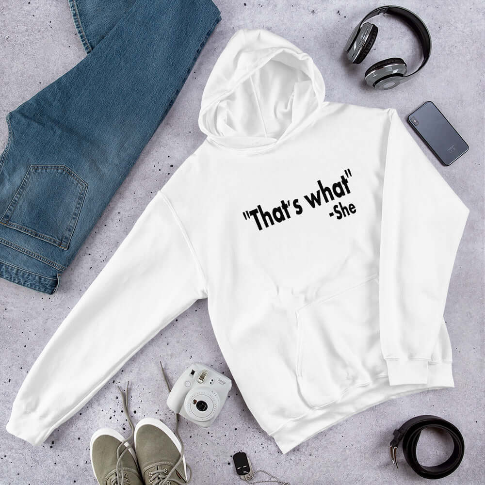 White hoodie sweatshirt with the funny quote That's what-she printed on the front.