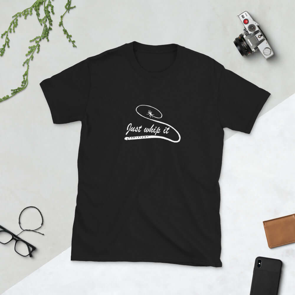 Black t-shirt with line drawing image of a leather bullwhip and the words Just whip it printed on the front.