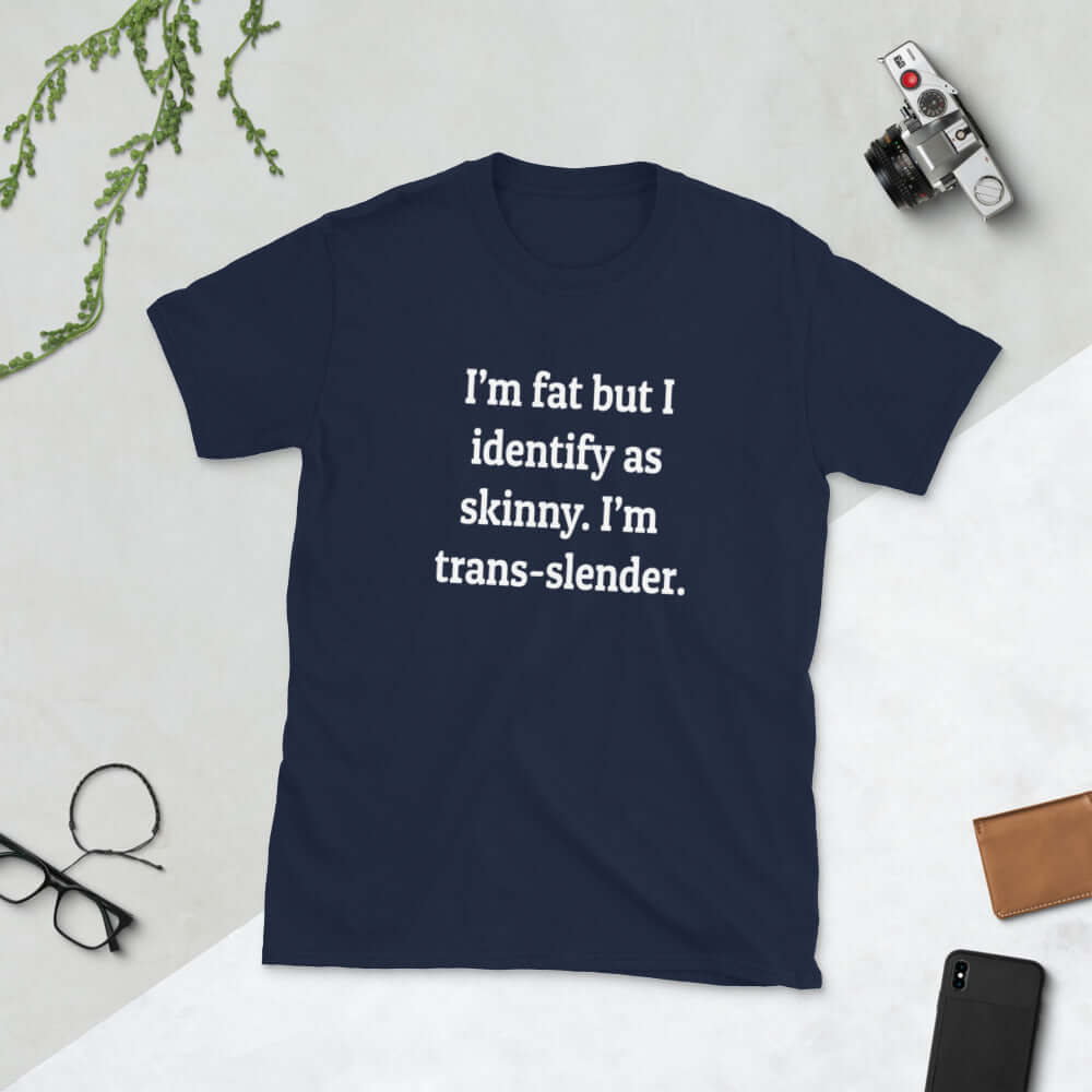 Navy blue t-shirt with the phrase I'm fat but I identify as skinny. I'm trans-slender printed on the front.
