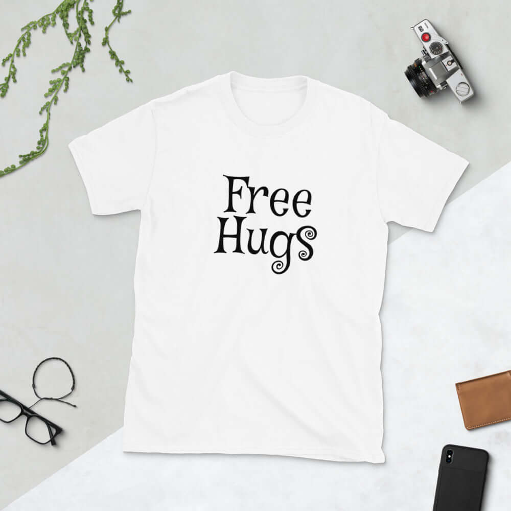 White t-shirt with the words Free Hugs printed on the front.