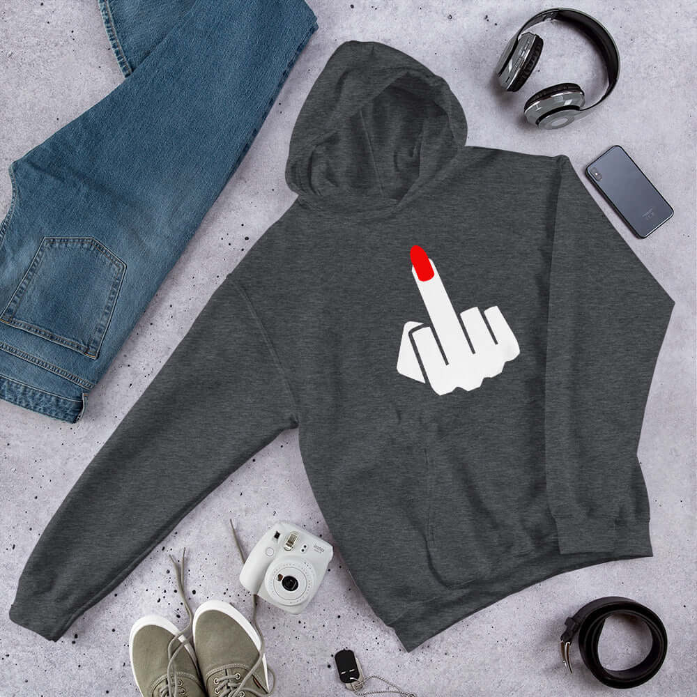 Dark heather grey hoodie sweatshirt with an image of a middle finger with long red fingernail silhouette printed on the front.