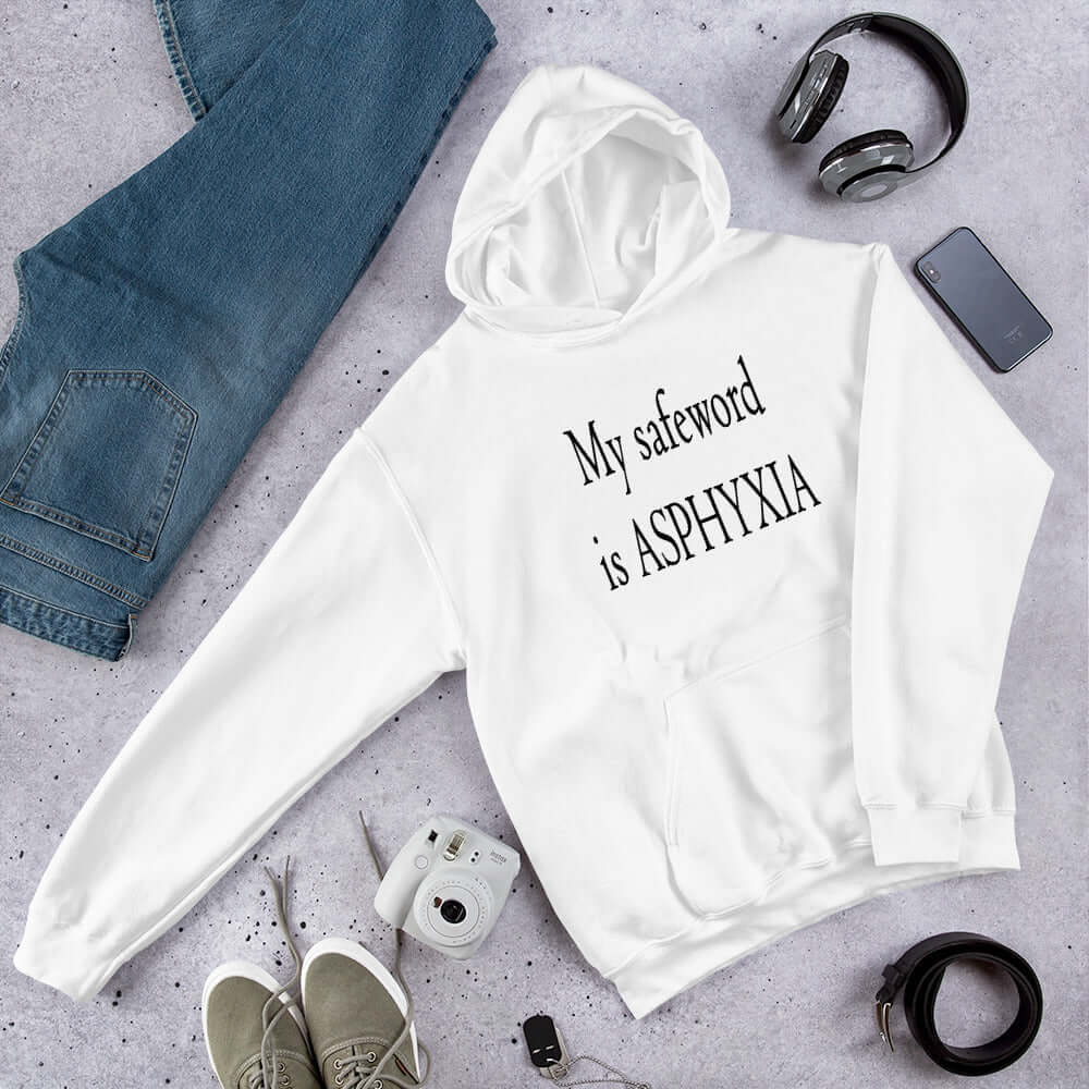 White hoodie sweatshirt with the phrase My safeword is asphyxia printed on the front.