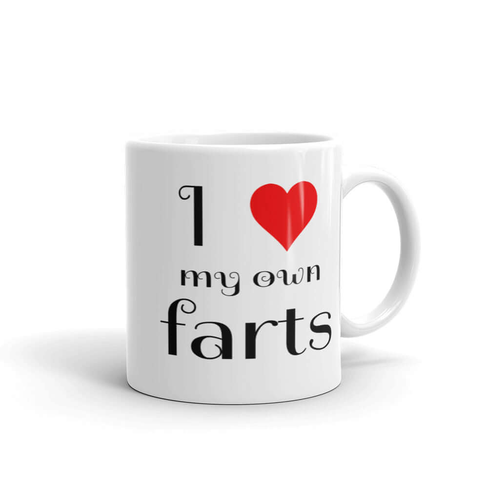 White ceramic coffee mug with I heart my own farts printed on both sides of the mug.