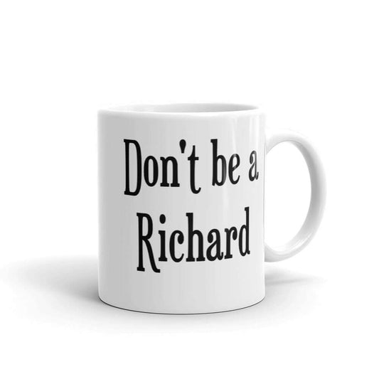 White ceramic mug with the phrase Don't be a Richard printed on both sides of the mug.