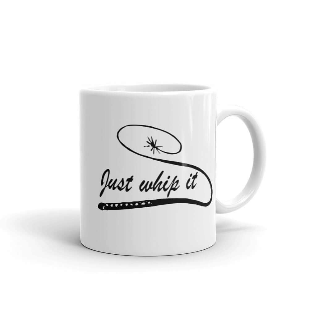 White ceramic coffee mug with a line drawing image of a leather bullwhip and the words Just whip it printed on both sides.