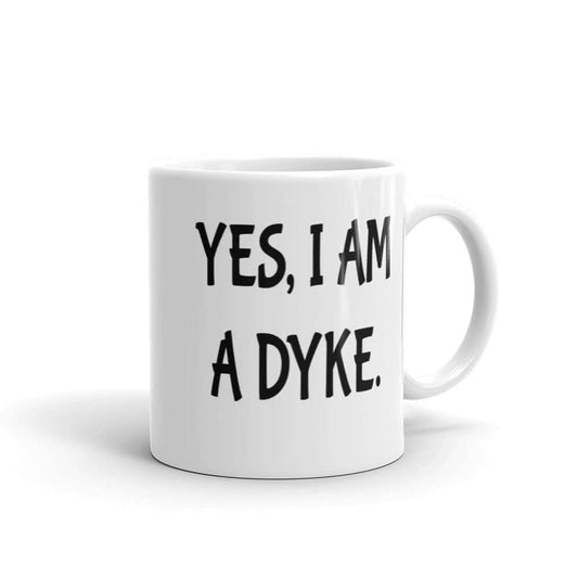 White ceramic coffee mug with the words Yes, I'm a dyke printed on both sides.