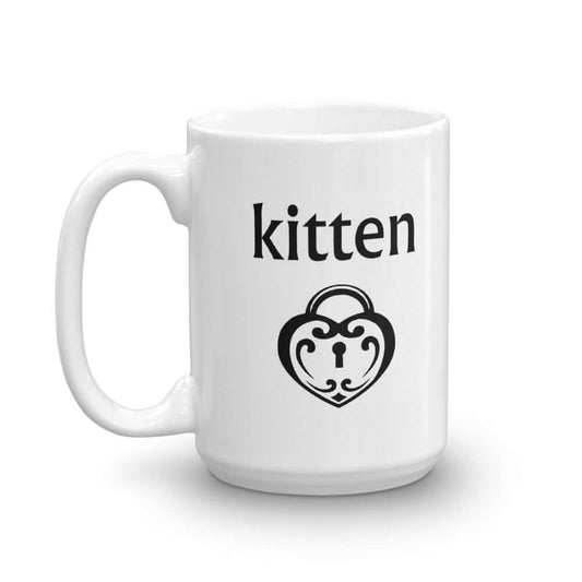 White ceramic coffee mug with an image of a BDSM heart shaped lock and the word kitten printed on both sides of the mug.