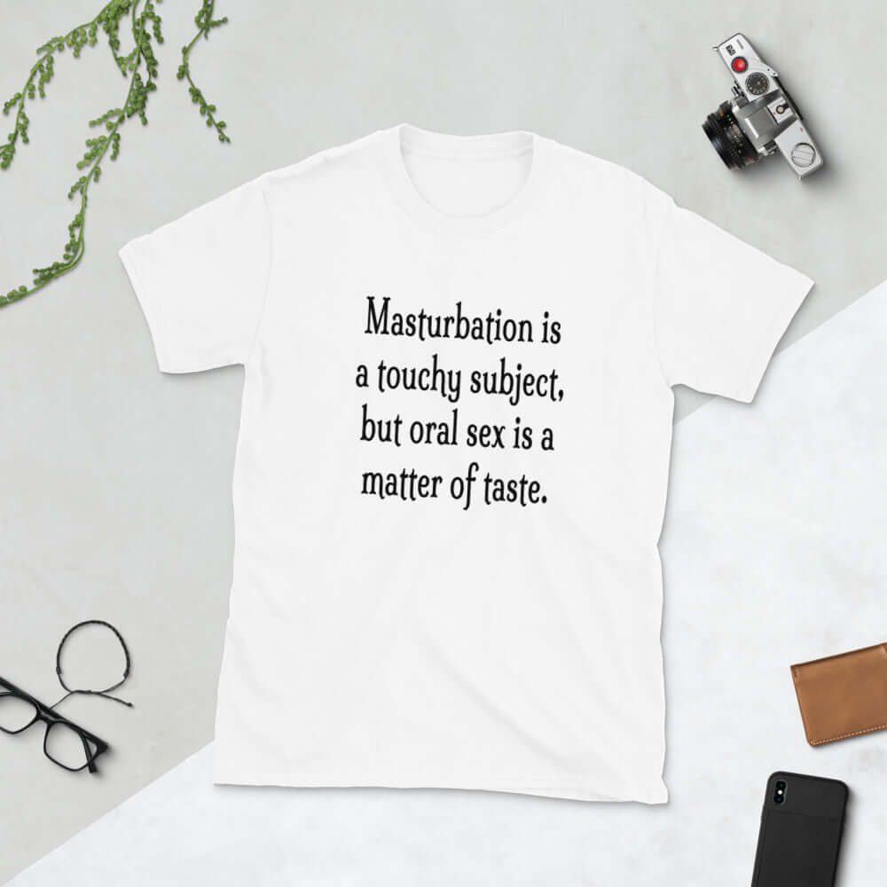 White t-shirt with the suggestive phrase Masturbation is a touchy subject, but oral sex is a matter of taste printed on the front.