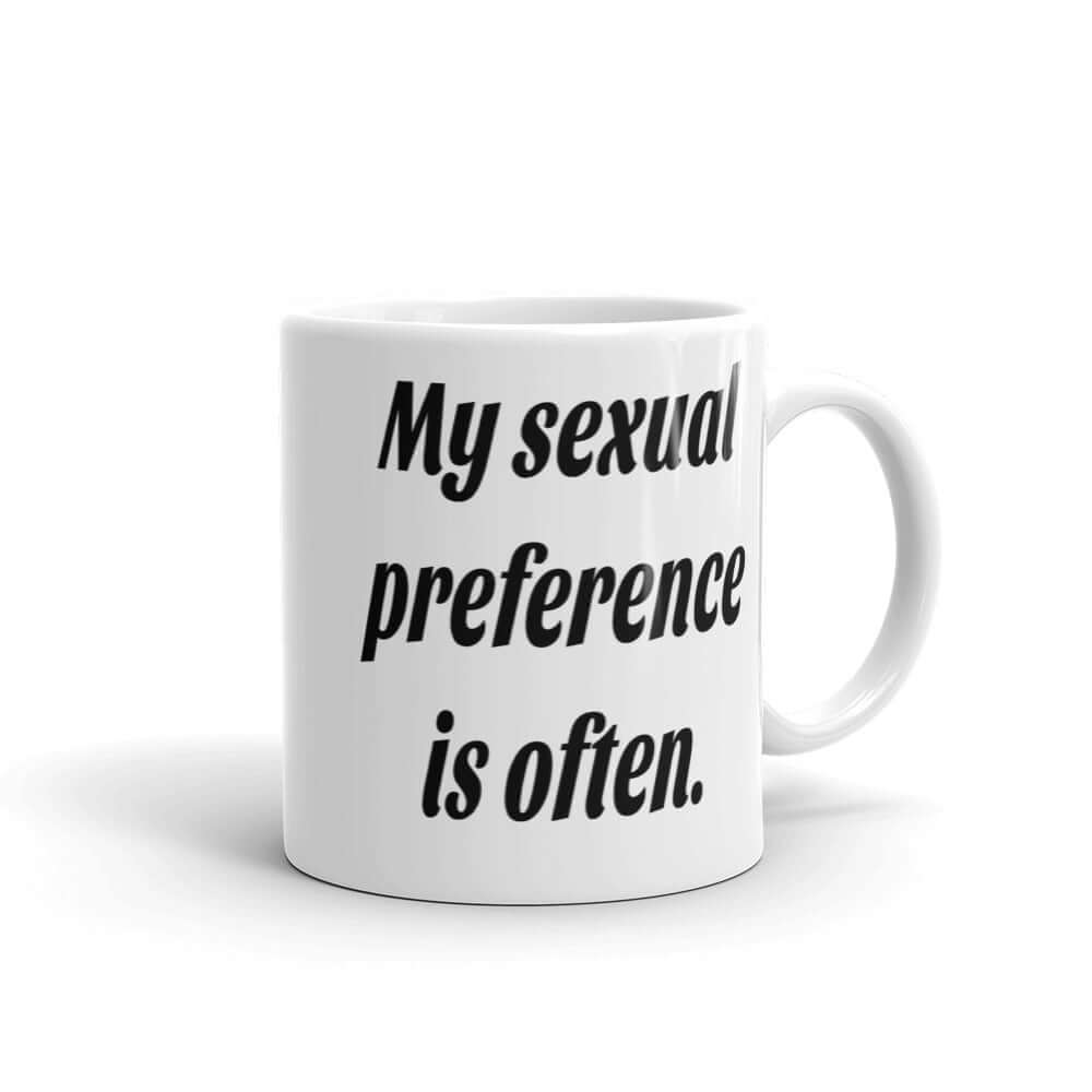 White ceramic coffee mug with the phrase My sexual preference is often printed on both sides.