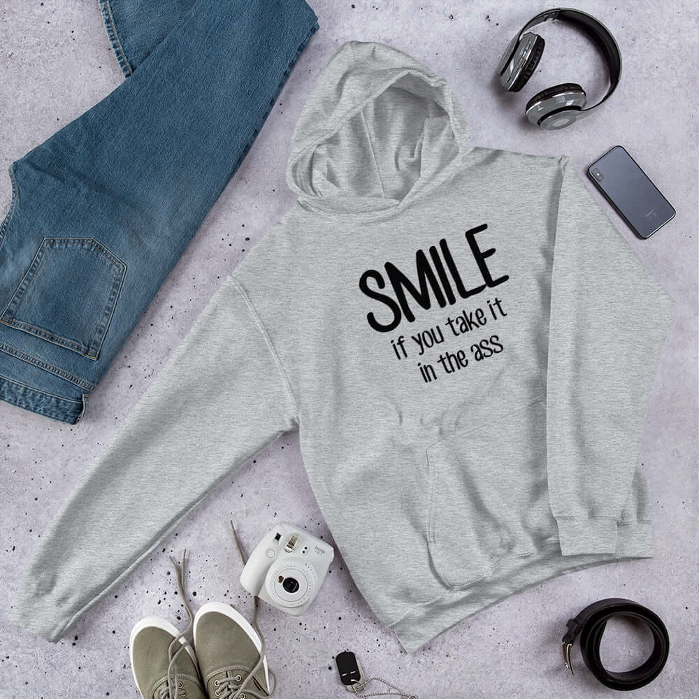 Funny anal sex joke Unisex Hoodie. Smile if you take it in the ass.