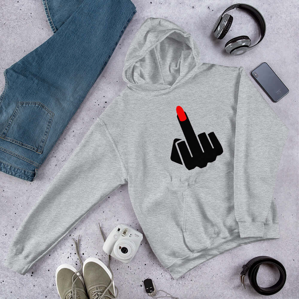 Light grey hoodie sweatshirt with an image of a middle finger with long red fingernail silhouette printed on the front.