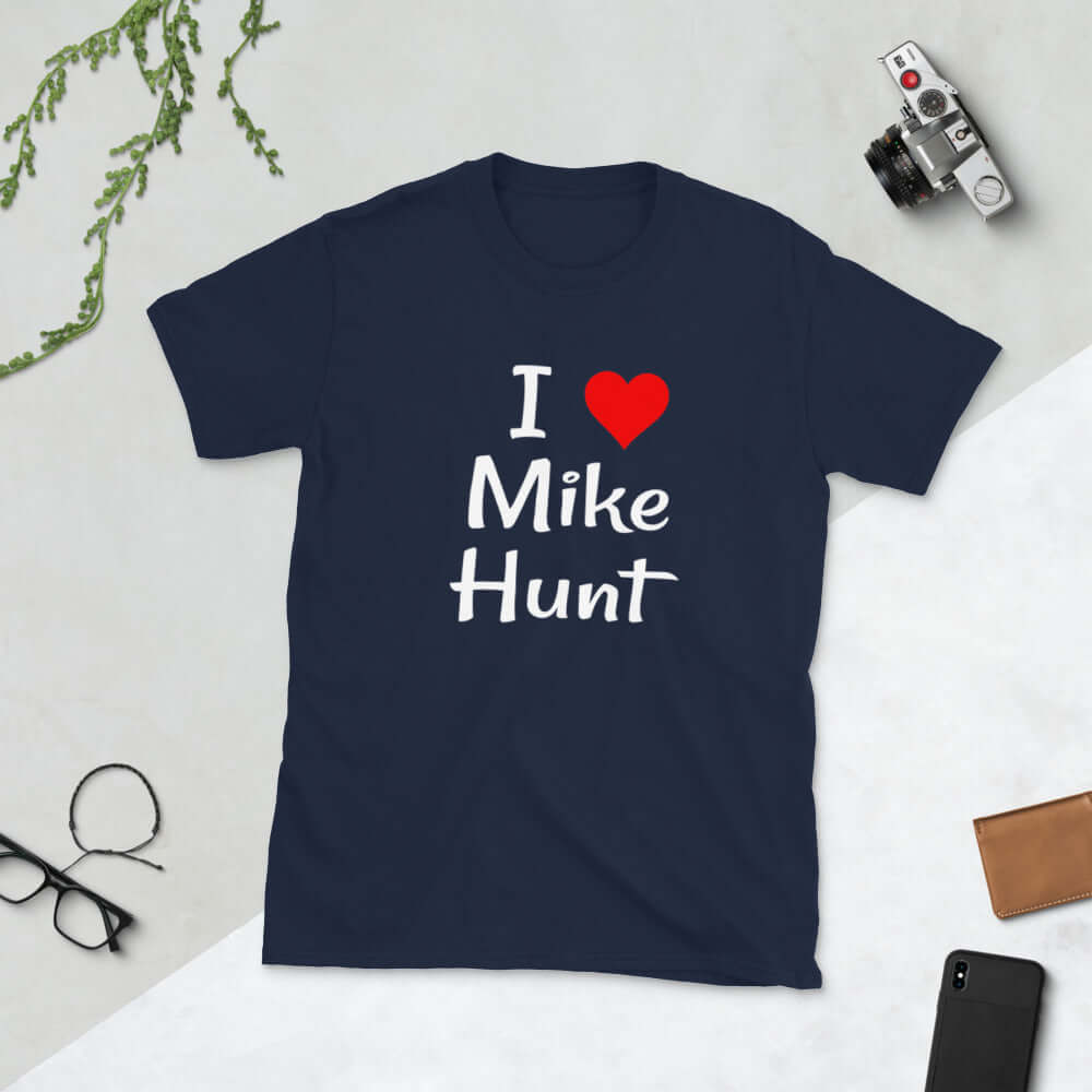 Navy blue t-shirt with pun I heart Mike Hunt printed on the front. The heart is red.