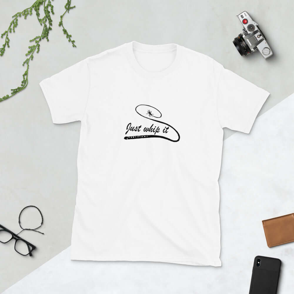 White t-shirt with line drawing image of a leather bullwhip and the words Just whip it printed on the front.