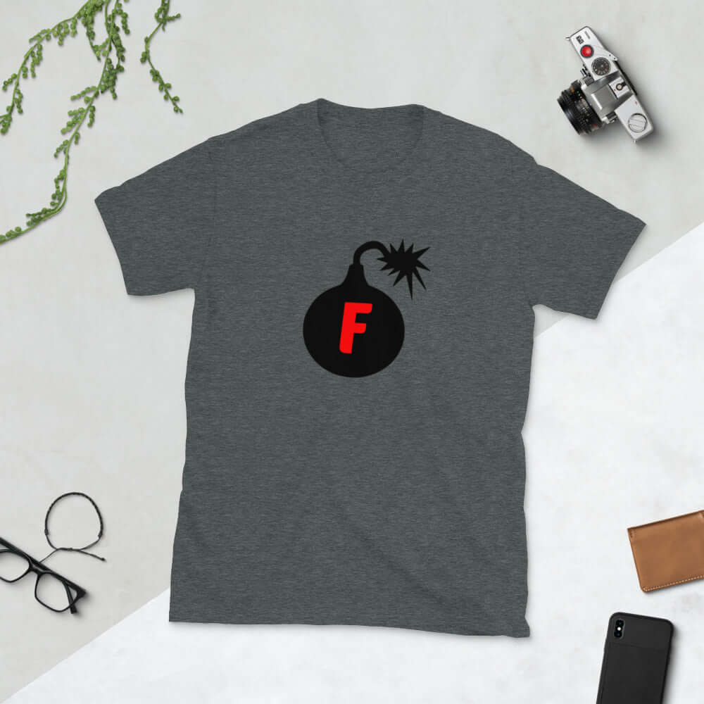 Dark heather grey t-shirt with an image of a bomb with the letter F printed in the center. The graphics are printed on the front of the shirt.