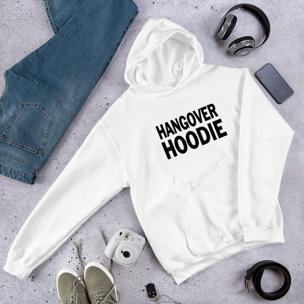 White hoodie sweatshirt with the words Hangover hoodie printed on the front.