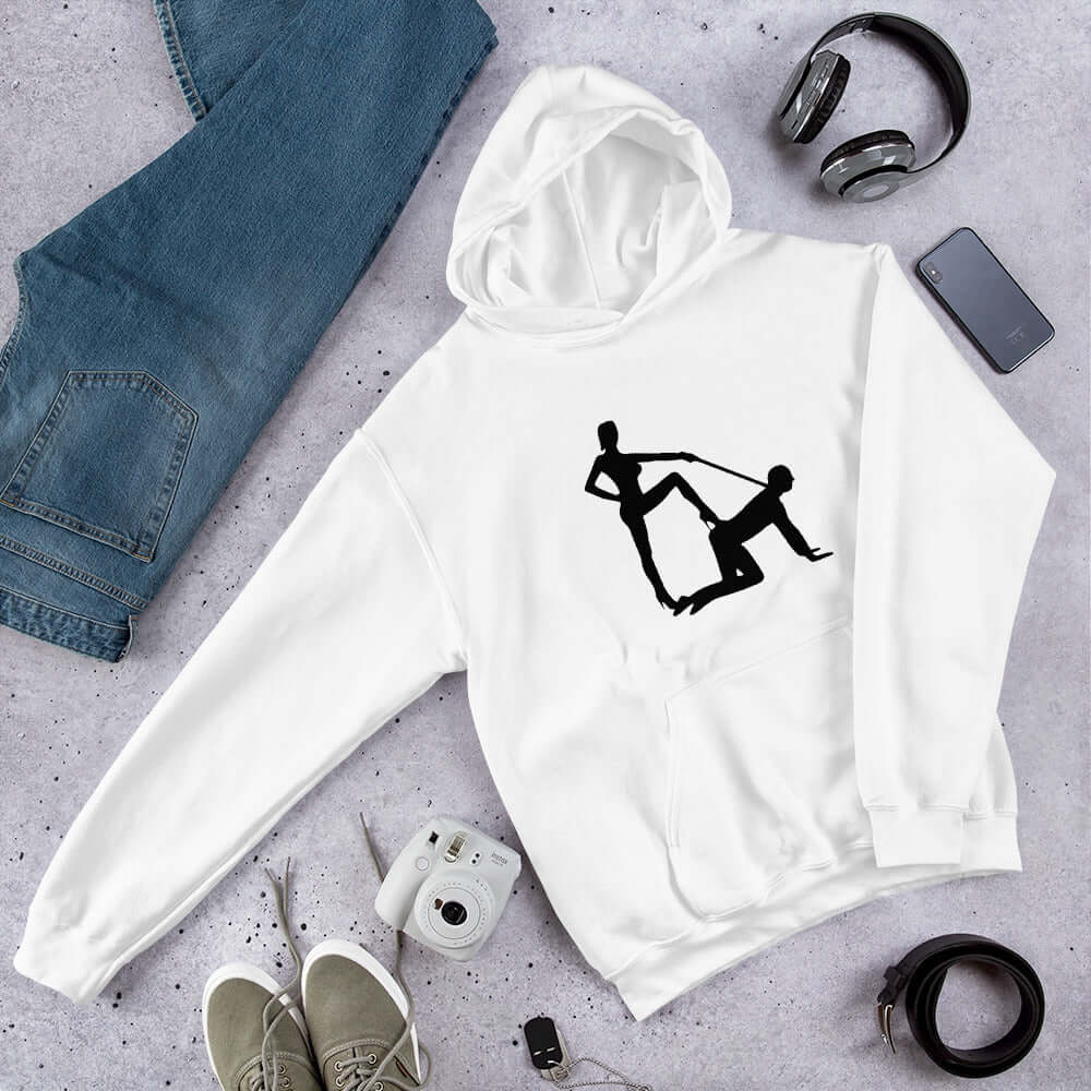 White hooded sweatshirt with silhouette image of a man on his hands and knees and a dominatrix holding his leash printed on the front.
