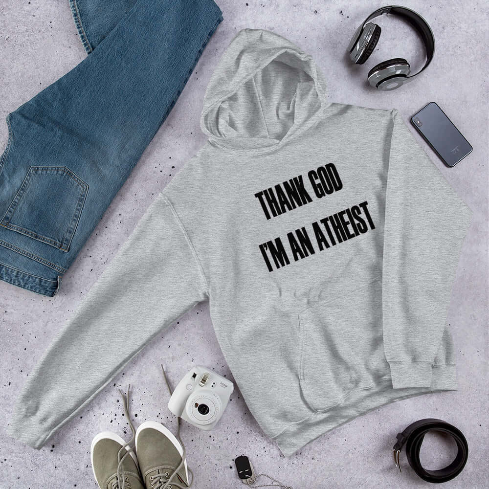 Light grey hoodie sweatshirt with Thank God I'm an atheist printed on the front.