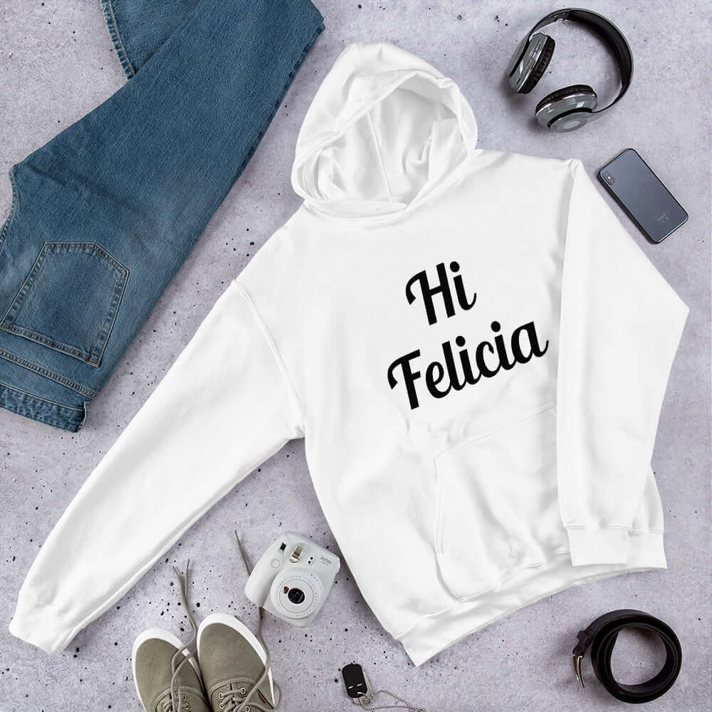 White hoodie sweatshirt with the words Hi Felicia printed on the front.