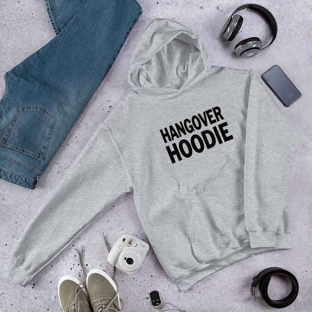 Light grey hoodie sweatshirt with the words Hangover hoodie printed on the front.