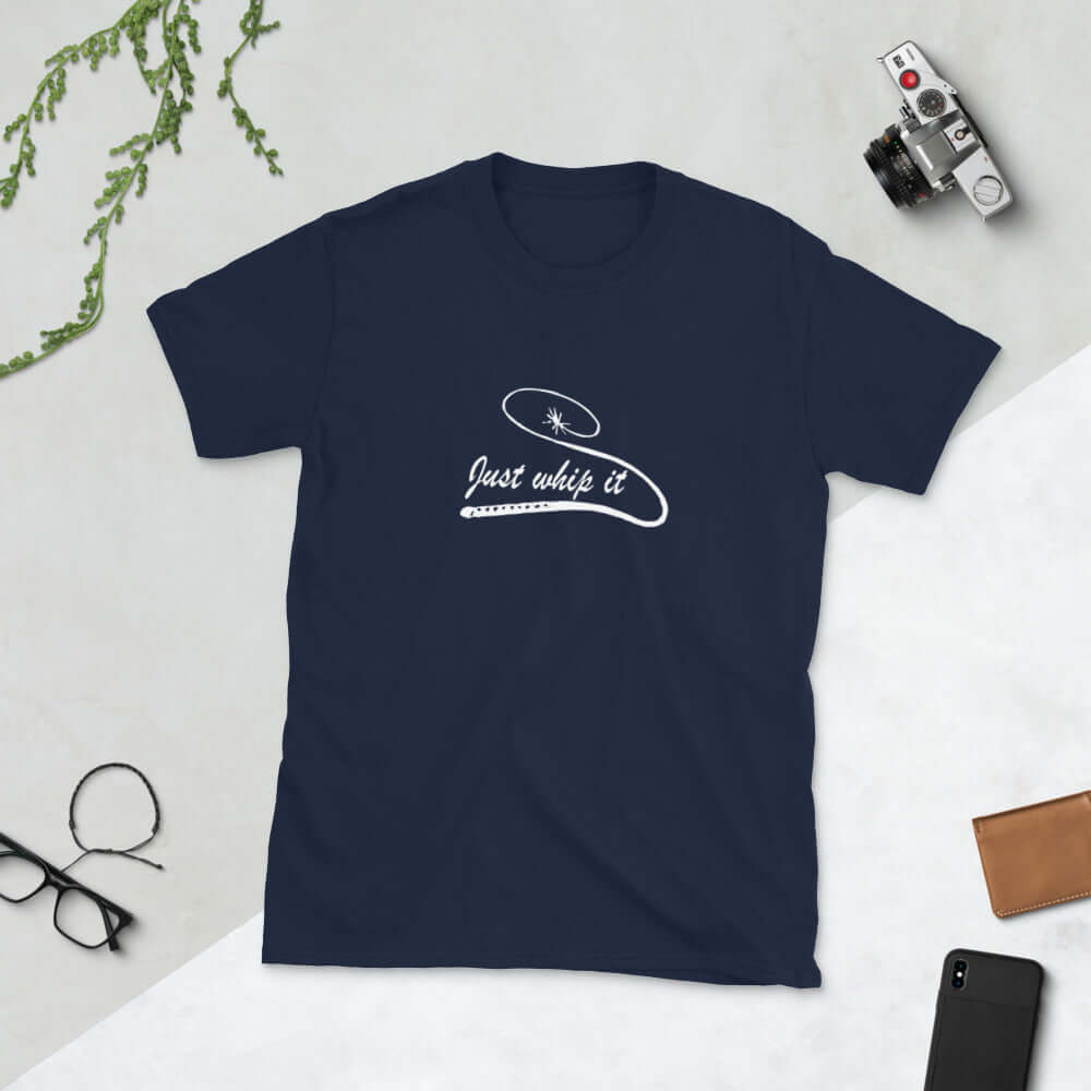 Navy blue t-shirt with line drawing image of a leather bullwhip and the words Just whip it printed on the front.