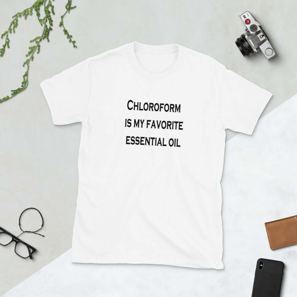 White t-shirt with the phrase Chloroform is my favorite essential oil printed on the front.