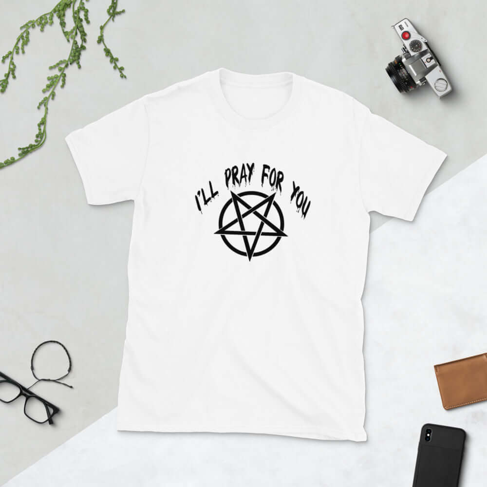 White t-shirt with image of a pentagram and the words I'll pray for you printed on the front.