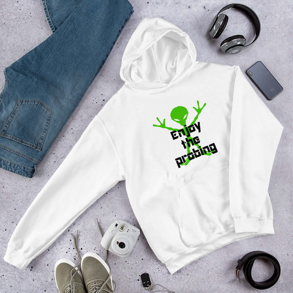 White hoodie sweatshirt with an image of an alien and the funny phrase Enjoy the probing printed on the front.