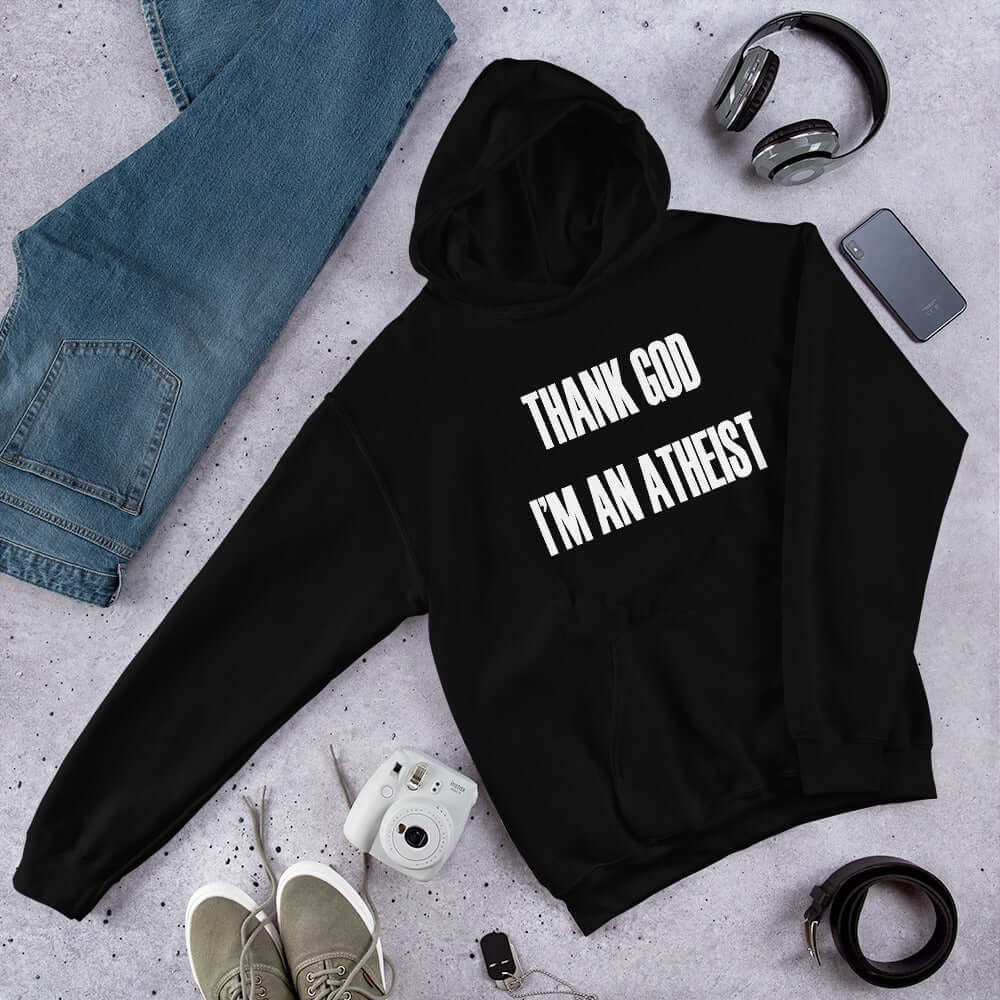 Black hoodie sweatshirt with Thank God I'm an atheist printed on the front.