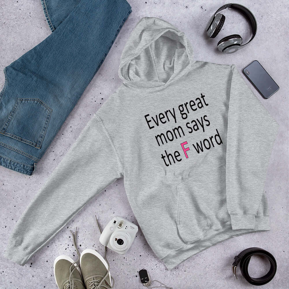 Light grey hoodie sweatshirt that has the phrase Every great Mom says the F word printed on the front.