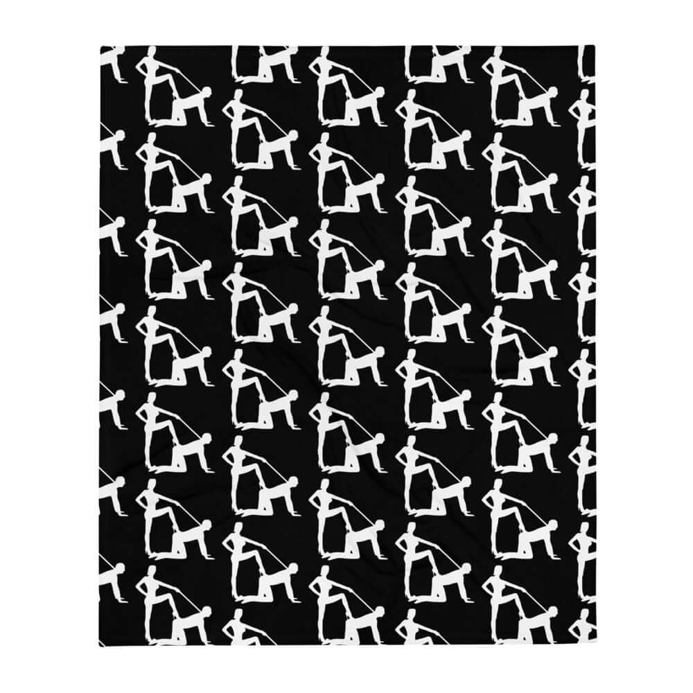 Black fleece throw blanket with the image of a silhouette of a man on his hands and knees and a dominatrix holding his leash. The image is printed in a repeating pattern all over the blanket.