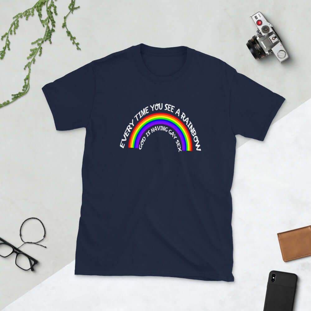 Navy blue t-shirt with a rainbow graphic & the phrase Every time you see a rainbow God is having gay sex printed on the front.