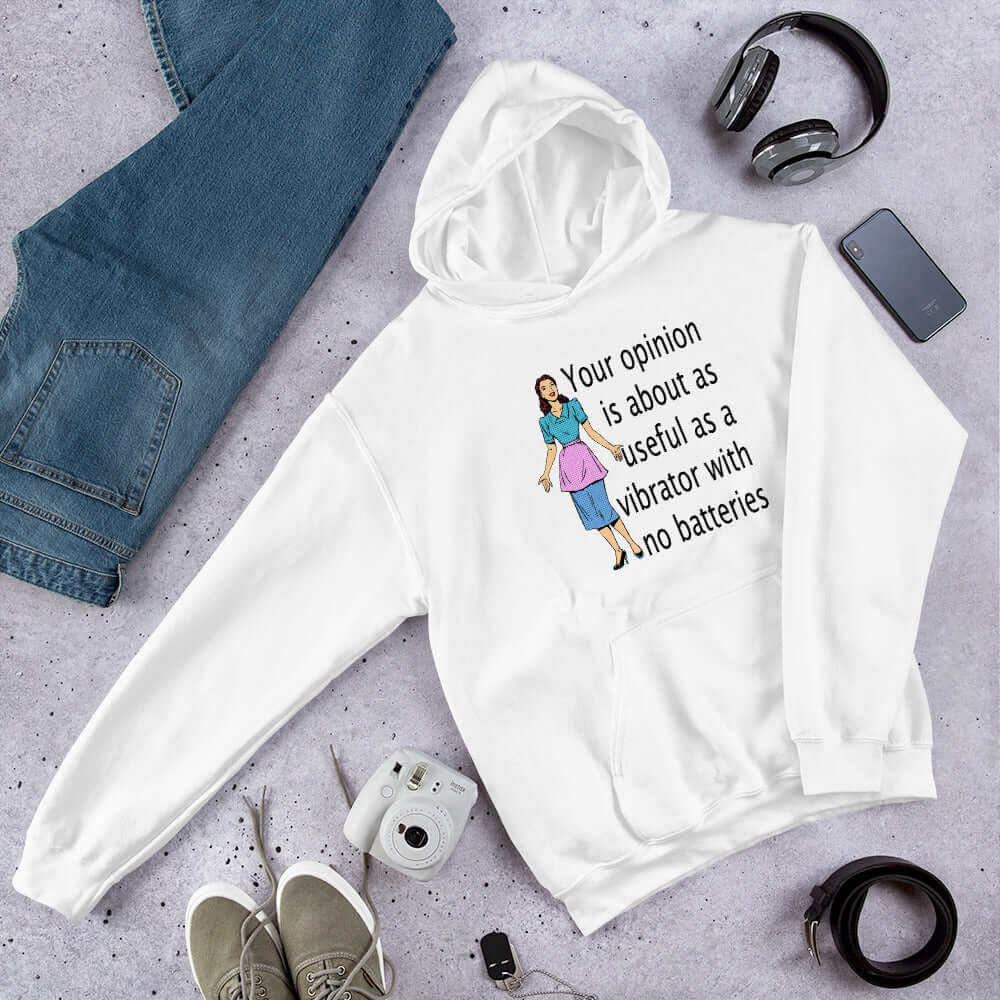 White hoodie sweatshirt with an image of a retro woman and the phrase Your opinion is about as useful as a vibrator with no batteries printed on the front.