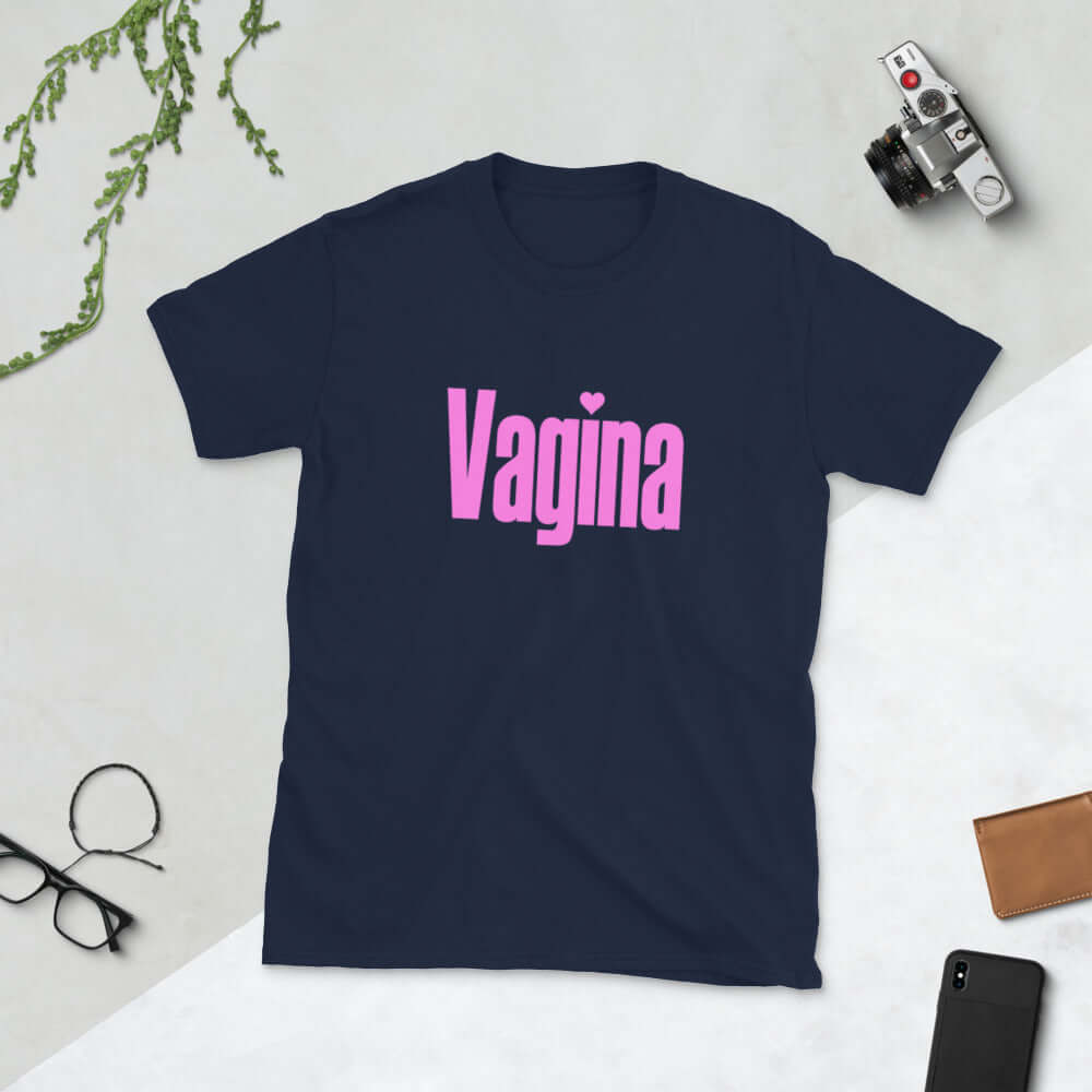 Navy blue t-shirt with the word Vagina printed on the front. The word vagina is in pink color text.