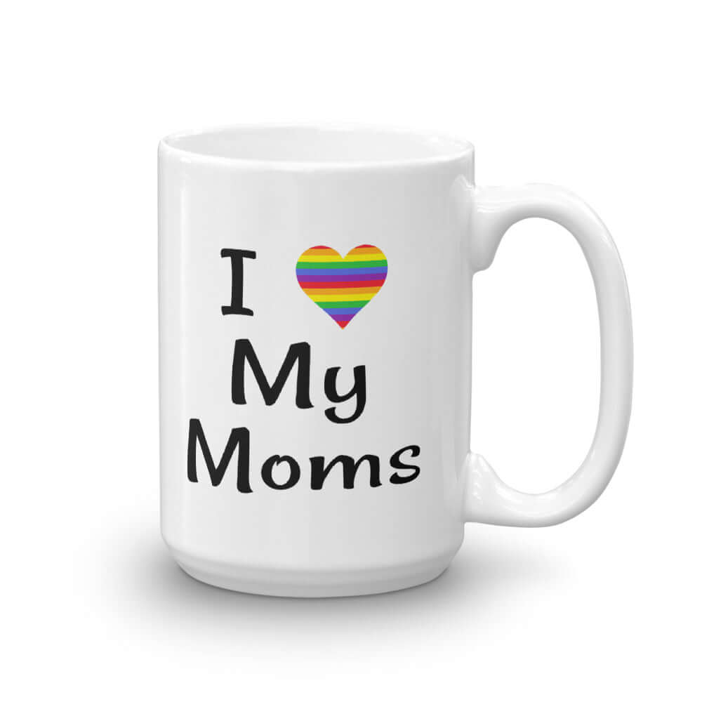 White ceramic coffee mug with the phrase I heart my Moms printed on both sides of the mug. The heart is rainbow.